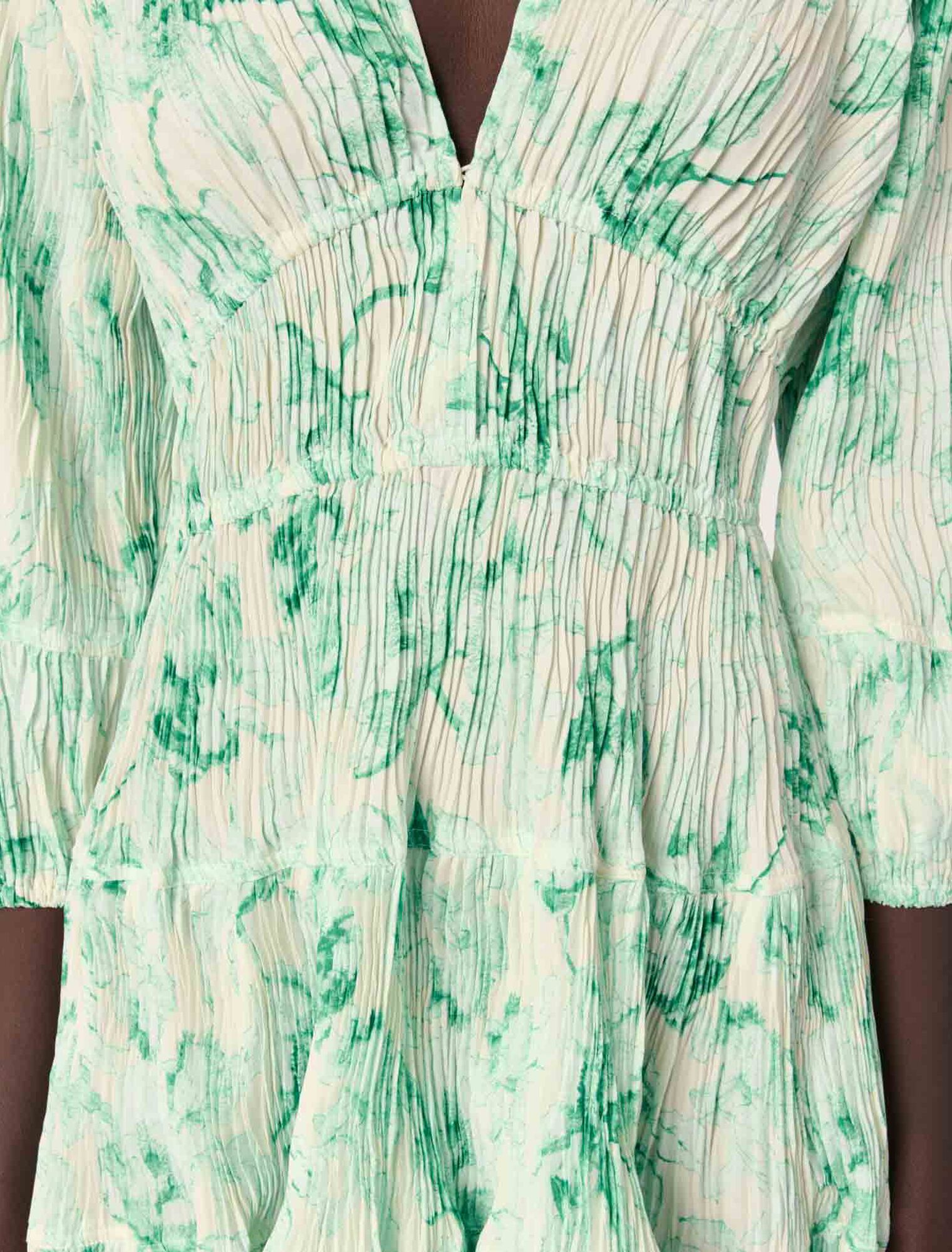 Patterned pleated mini dress