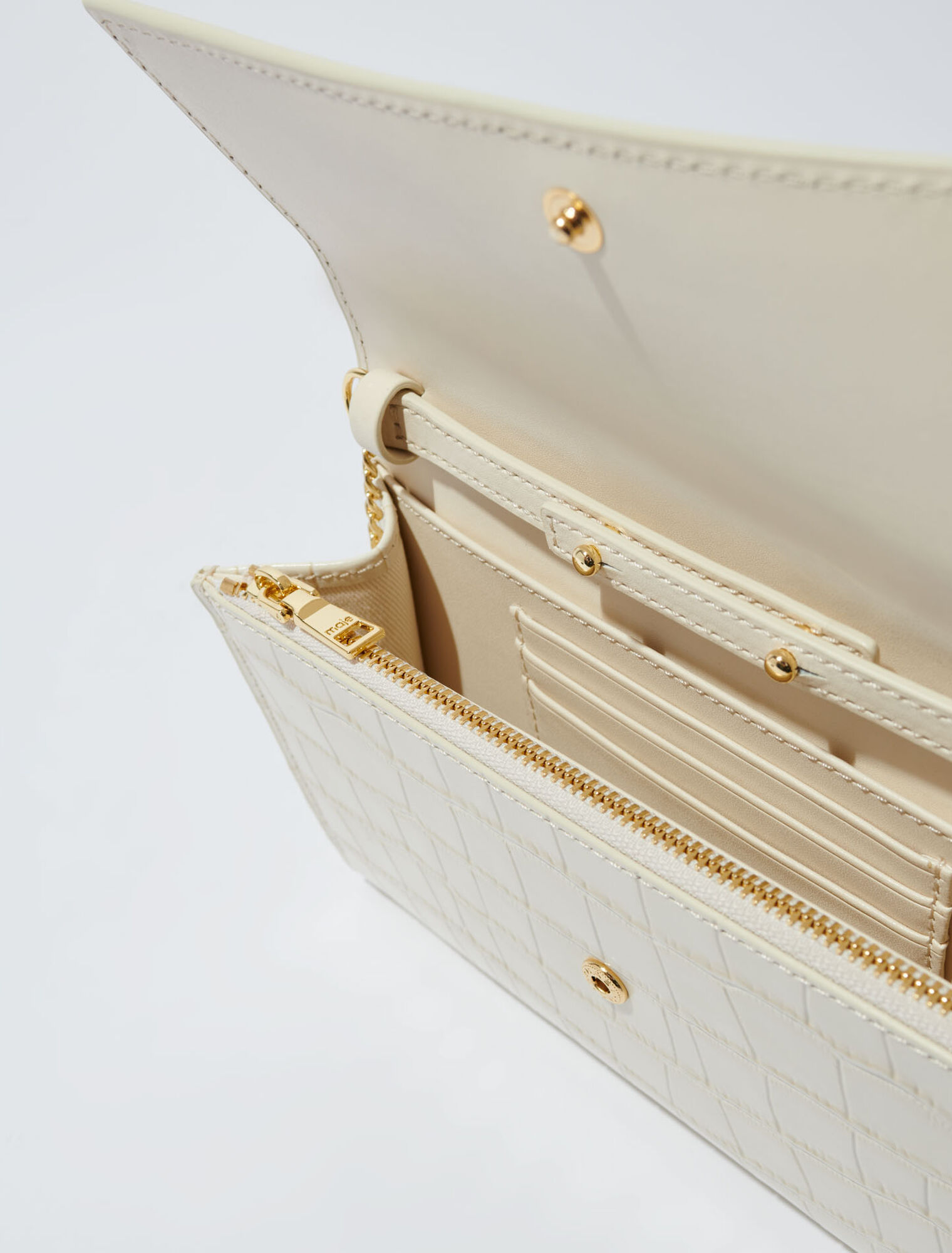 Croc-effect embossed leather bag