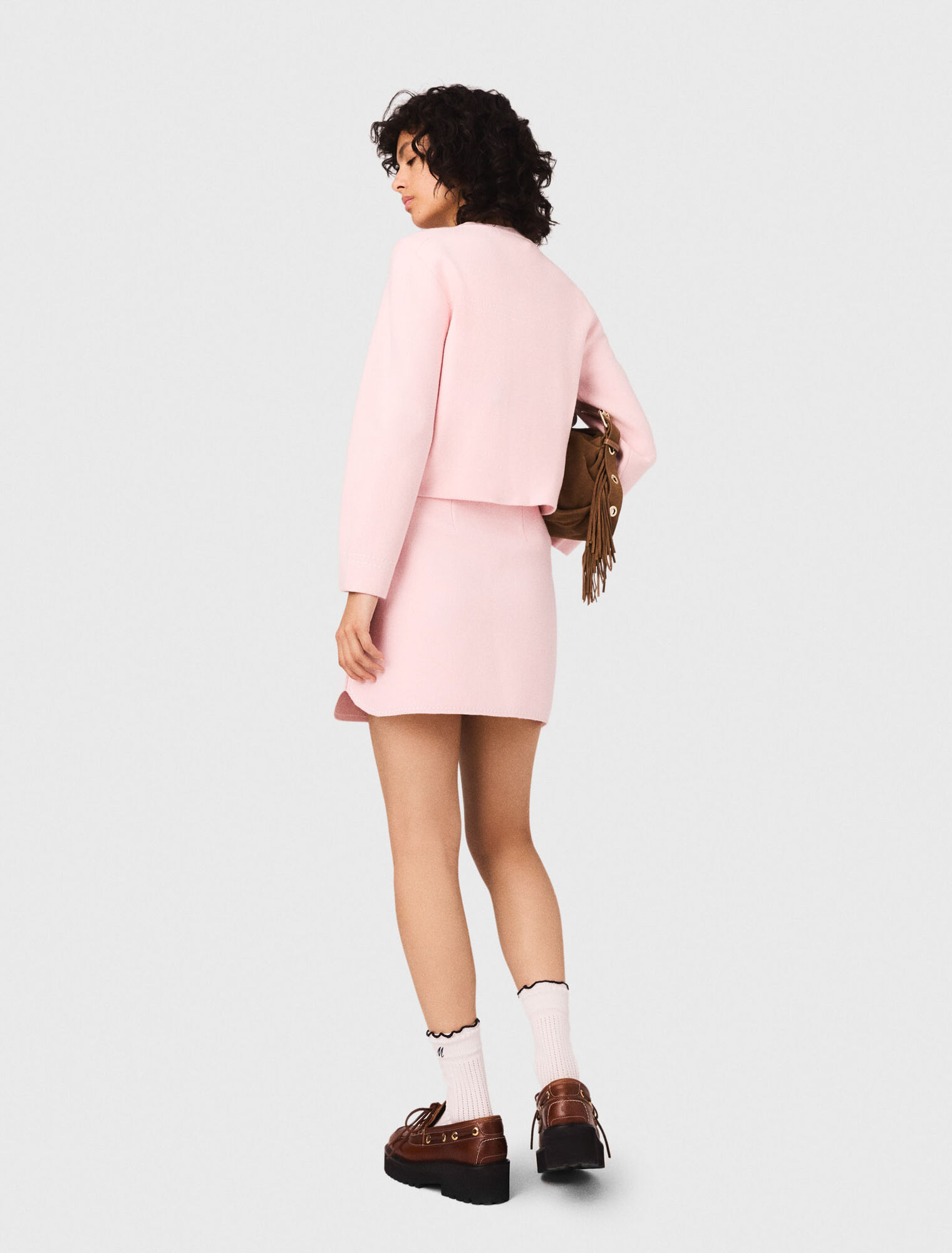 Short topstitched knit skirt